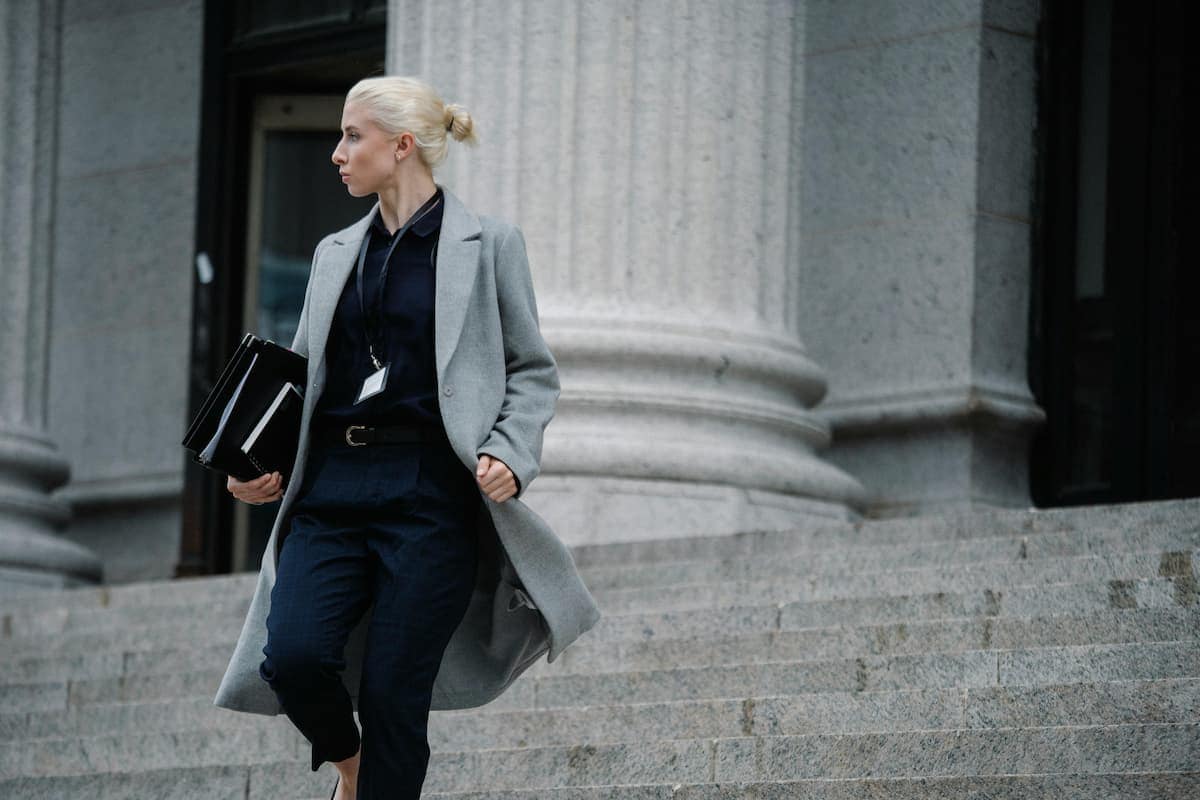 Certified process server at Florida courthouse steps — YM Doc Services