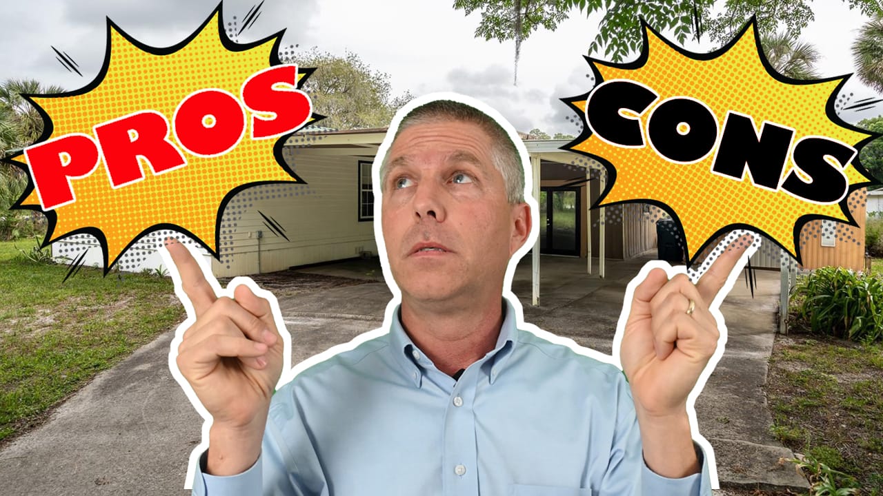 Pros and cons with Chuck and mobile home in the background